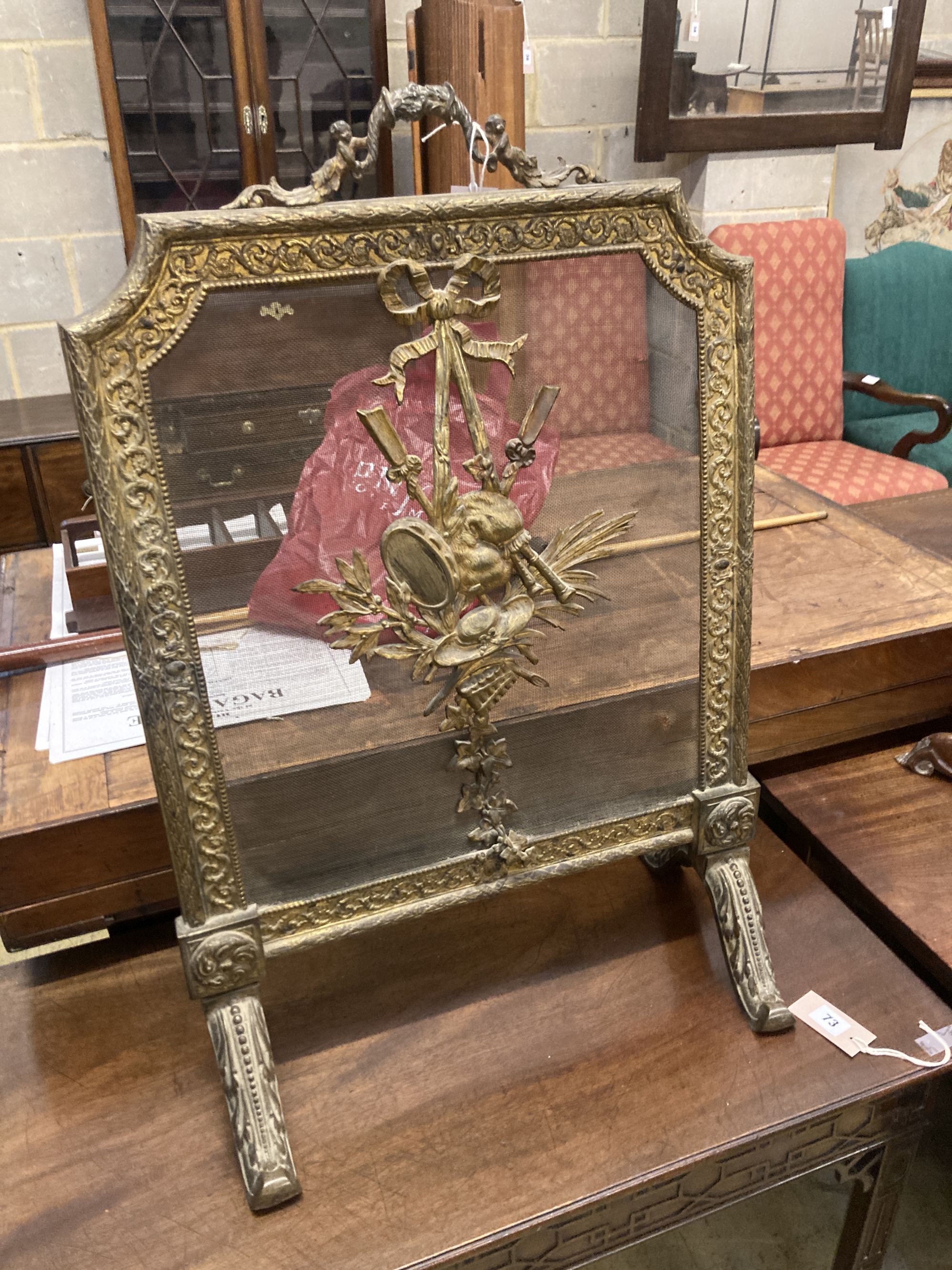 An ormolu fire guard, width 55cm, height 79cm